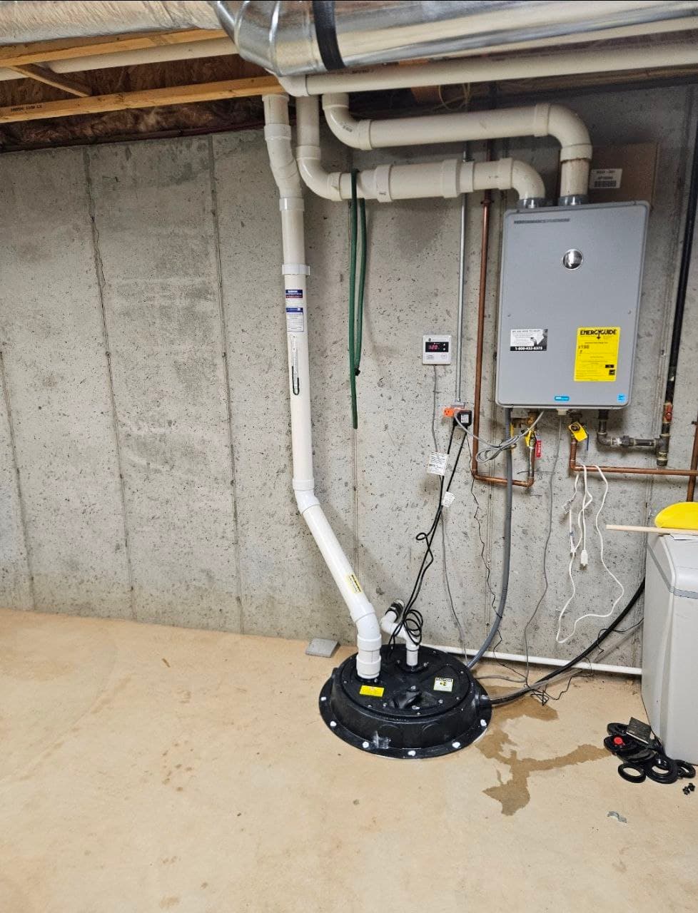 Radon mitigation fan unit for reducing radon levels