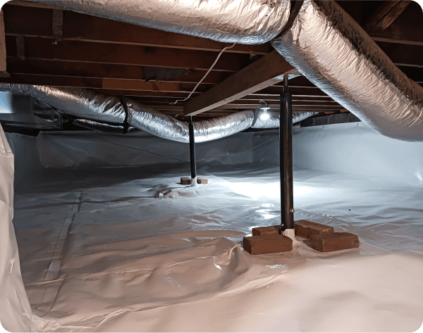 Crawl space sealed and encapsulated with vapor barrier